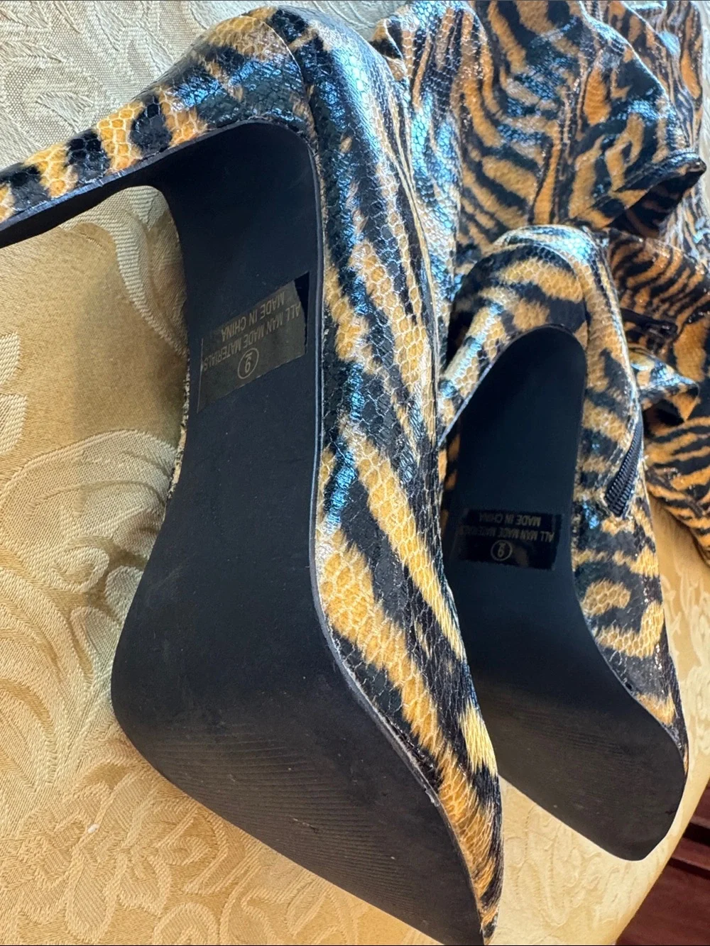 Fashion Nova tiger-print thigh-high boots size 9